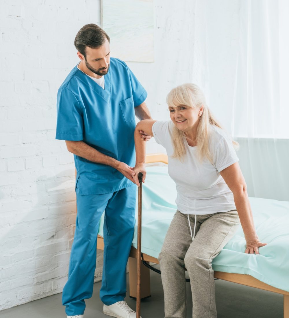 male-nurse-helping-senior-woman-with-walking-stick.jpg male-nurse-helping-senior-woman-with-walking-stick.jpg